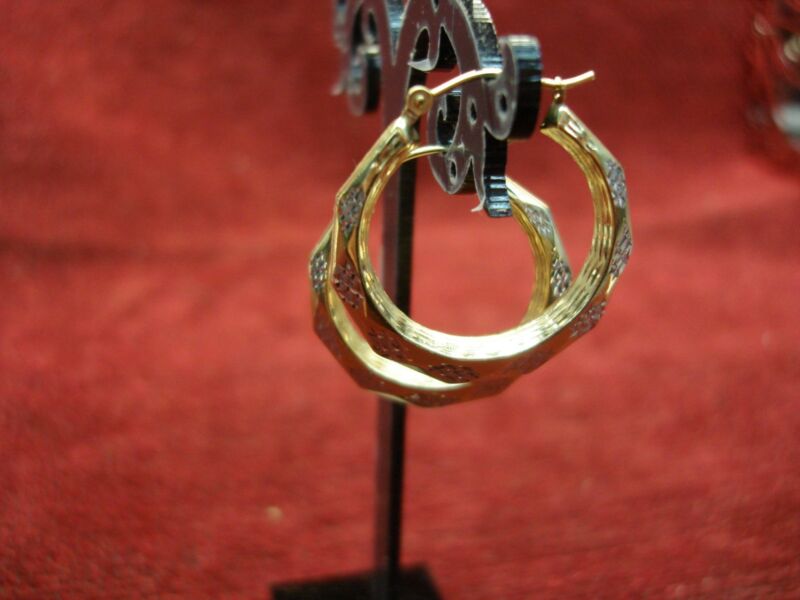 10K yellow and white gold hoop earrings with diamond cut design