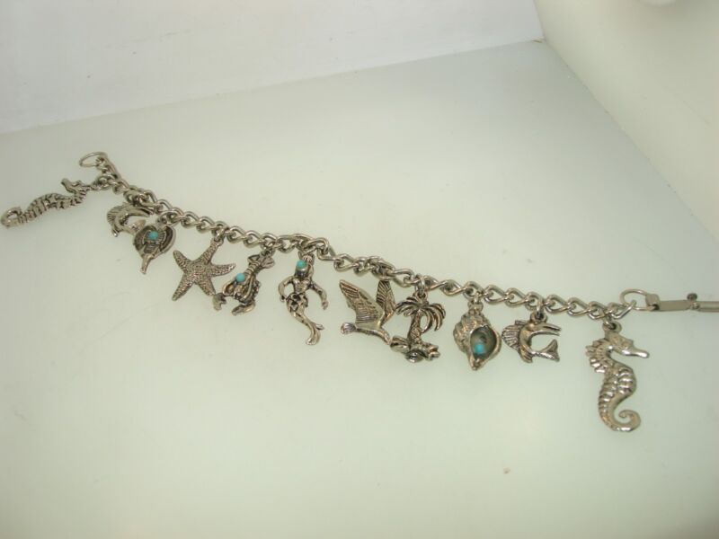 Vintage silver seashore charm bracelet with seahorse, starfish and turquoise beads