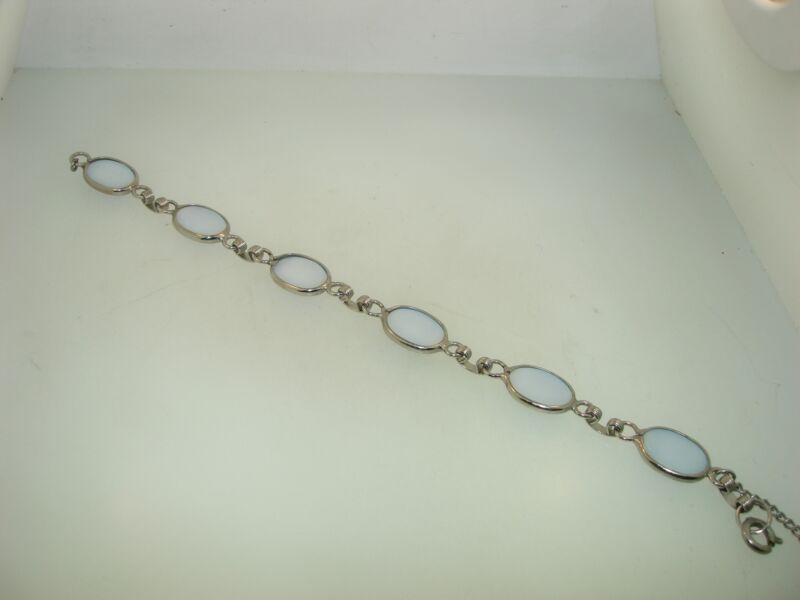 Vintage 1960s blue art glass bracelet with silver molding and oval stones