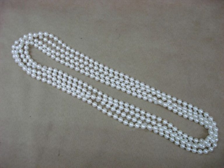 Vintage 1960s-70s cream faux pearl necklace, long strand