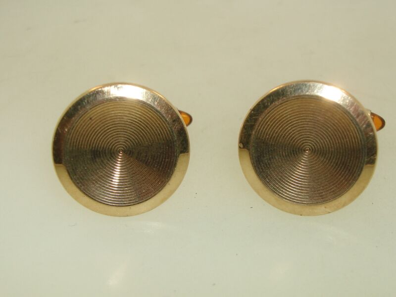 Vintage Krementz gold tone amber glass bullet cufflinks from the 1940s-1950s