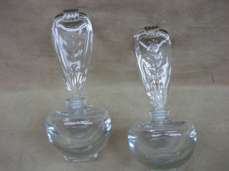 Pair of vintage lead crystal perfume bottles with ornate stoppers, excellent condition