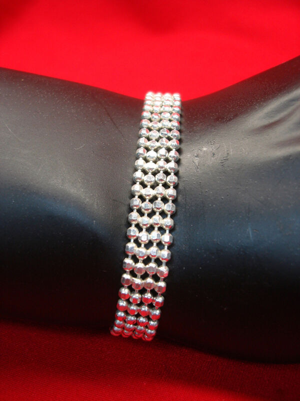 Sterling silver beaded bracelet with beveled edges