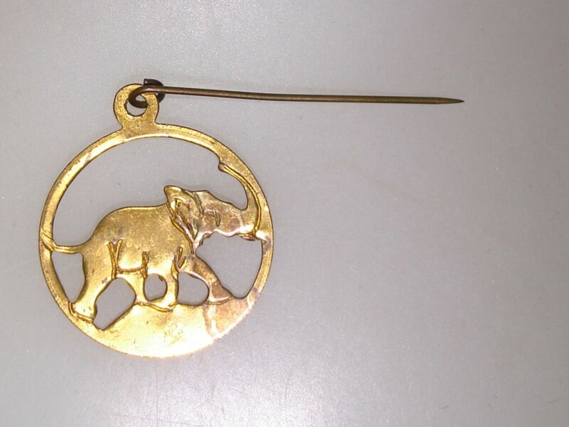 Antique gold-tone elephant hat pin with trunk up design and Union Label