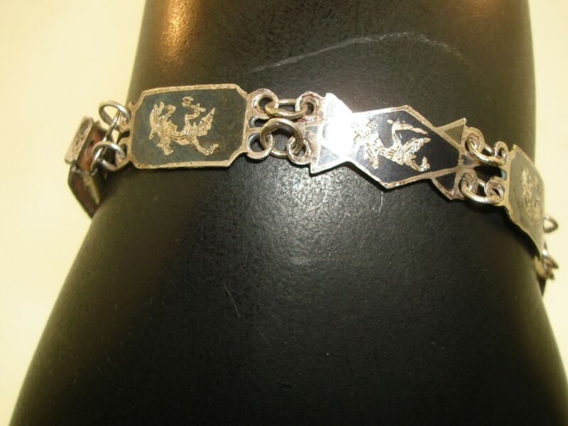 Vintage Siamese sterling silver bracelet with Balinese dancer motifs
