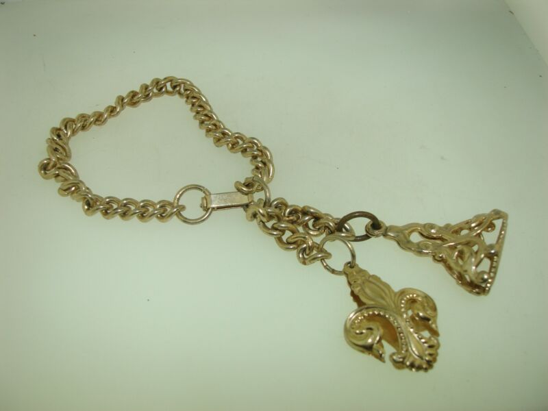 Vintage faux gold fleur-de-lis and fob seal charm bracelet