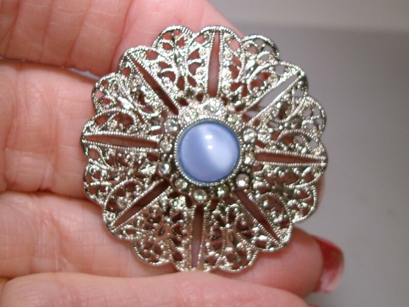 Vintage silver filigree pin with faux moonstone and rhinestones
