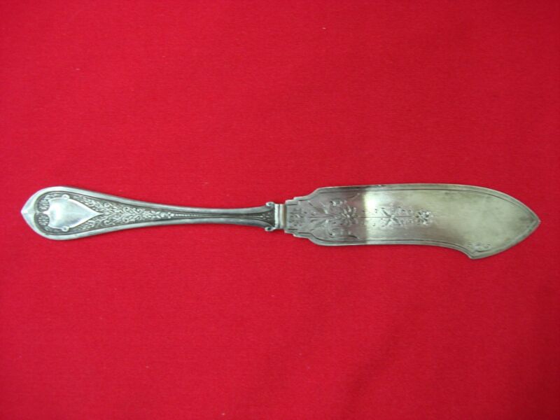 Antique Wood & Hughes sterling silver Marguerite butter knife, bright cut design, 7 inches