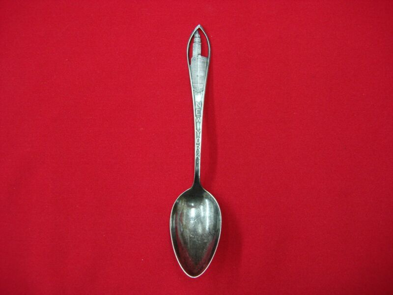 Vintage sterling silver souvenir spoon featuring the Woolworth Building, New York City
