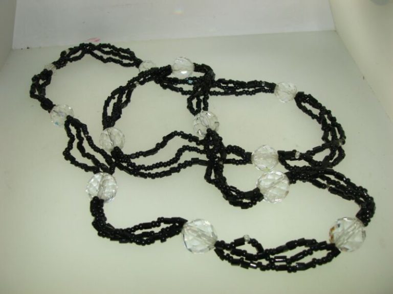 Vintage Art Deco necklace with three strands of black seed beads and clear glass beads
