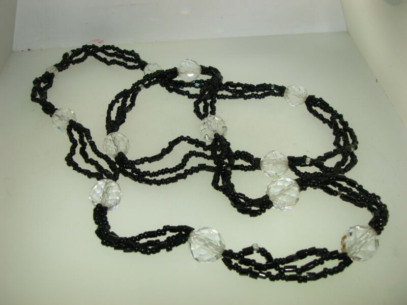 Vintage Art Deco necklace with three strands of black seed beads and clear glass beads