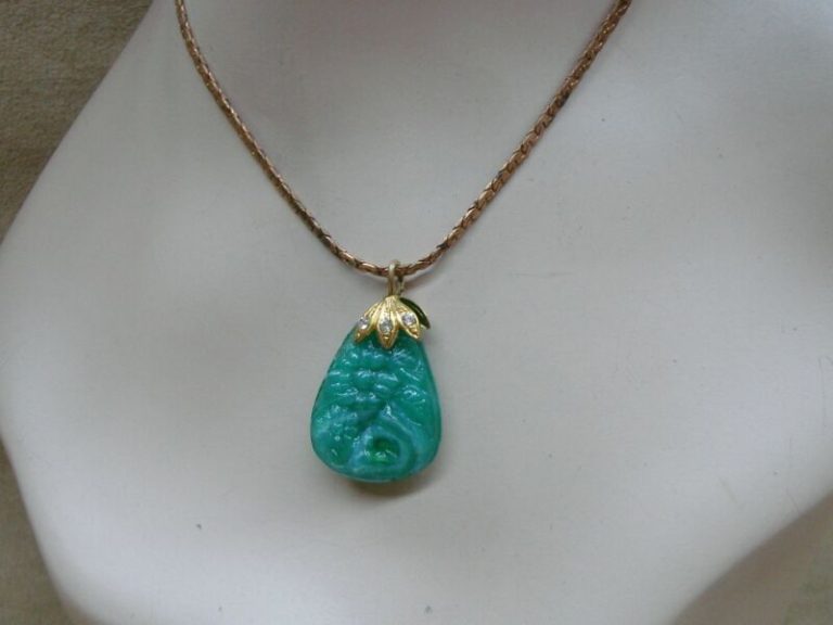 Vintage Chinese chrysoprase pendant necklace with carved flowers and swirls