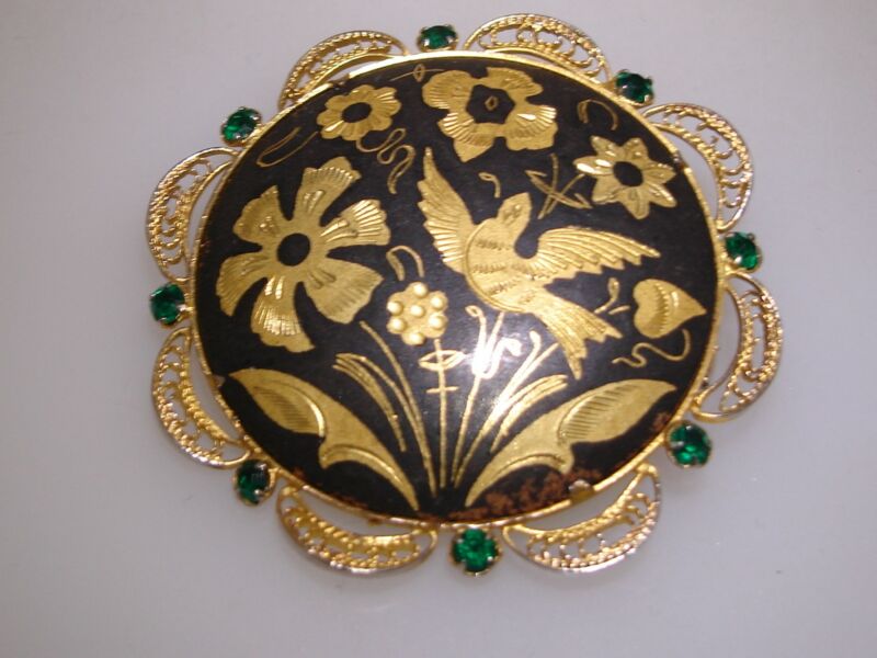Vintage gold-washed filigree pin with Damascene and rhinestones
