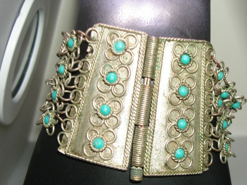 Vintage Etruscan silver bracelet with turquoise glass and unique trombone hinge.