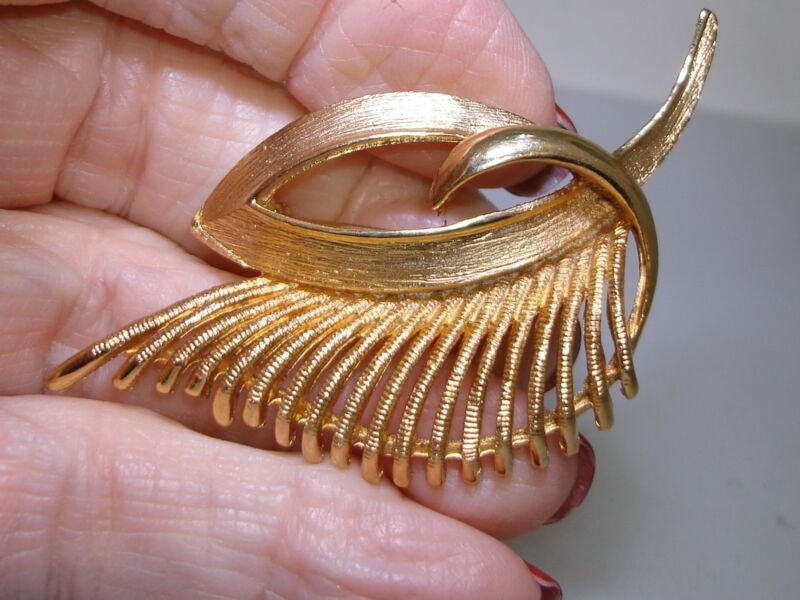 Vintage Coro gold tone brooch, 1970s, signed openwork design