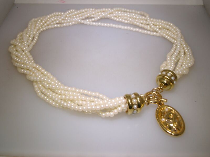 Vintage 1980s faux pearl choker necklace with eight strands of creamy white pearls
