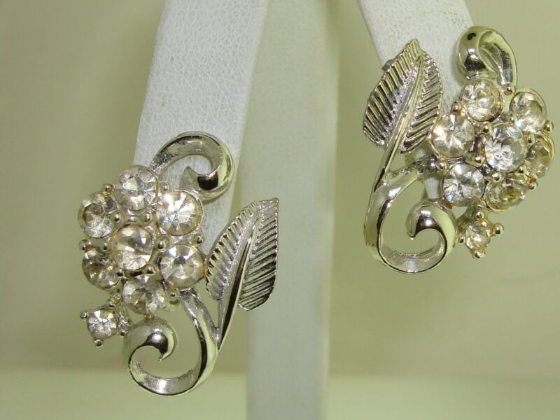 Vintage Coro rhinestone earrings - 1960s silver tone floral design