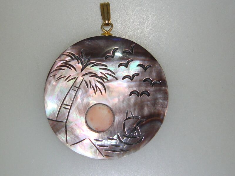 Vintage carved mother of pearl pendant with coral inlay and etched water scene