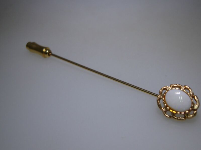 Vintage gold-tone filigree stick pin with 1 carat opal