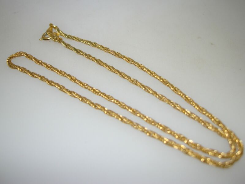 Vintage gold-tone woven choker necklace with Trifari hang tag