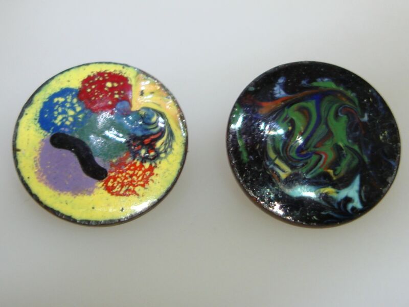 Pair of vintage, artisan-crafted enameled penny pins