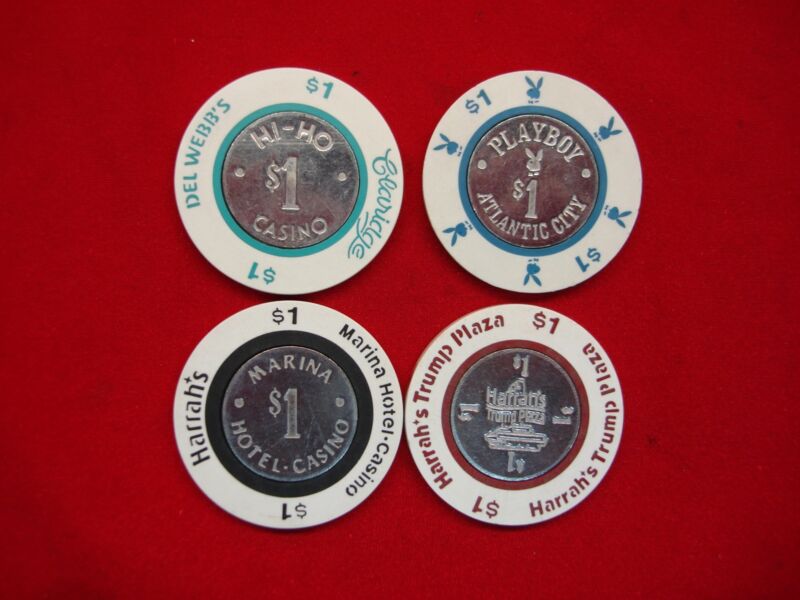 Vintage Atlantic City casino tokens set of 4 including Claridge, Harrah's, Trump Plaza & Playboy