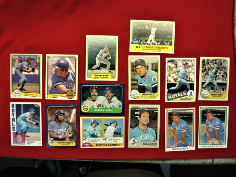 Collection of 14 George Brett baseball cards from Topps, Fleer, and Donruss