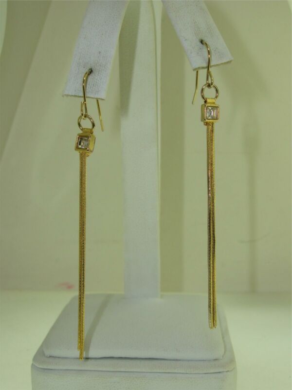 Gold tone double snake chain dangle earrings with cubic zirconia