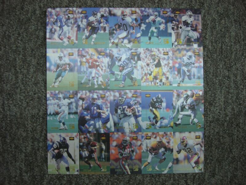 1995 Classic Images Icons Football Insert Set uncut sheet featuring Brett Favre, Emmitt Smith, Troy Aikman and Barry Sanders
