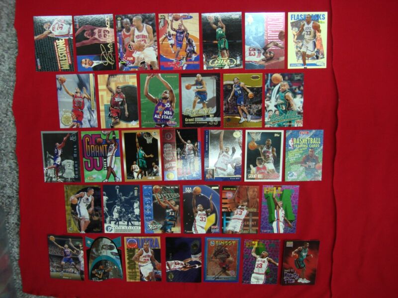 Grant Hill basketball card collection featuring rookies, premiums and inserts from his time with Duke, Pistons and USA Basketball.