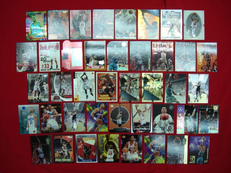 Alonzo Mourning basketball card collection featuring 42 rookies, premiums, and parallels from his time with Georgetown, Hornets, and Heat.