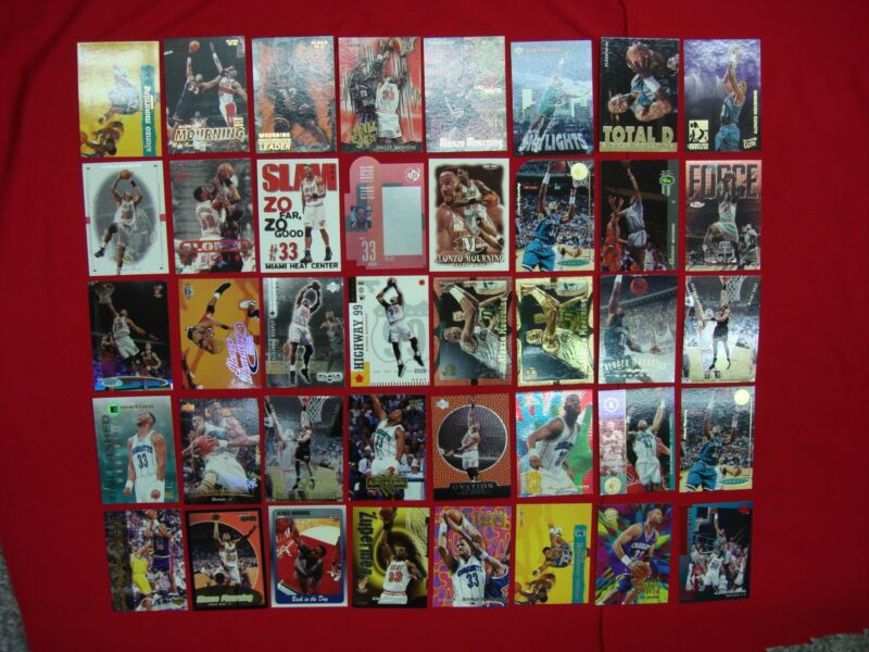 Alonzo Mourning basketball card lot of 40, featuring rookies, premiums, parallels and inserts
