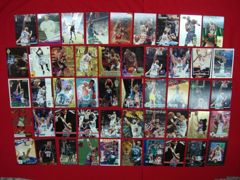 Alonzo Mourning basketball card lot featuring rookies, premiums, and parallels