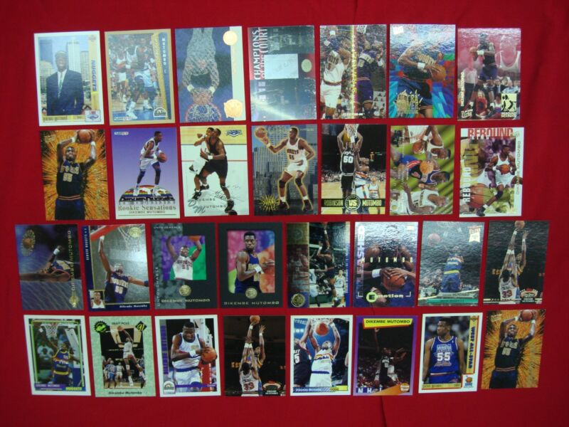 Collection of 30 Dikembe Mutombo basketball cards