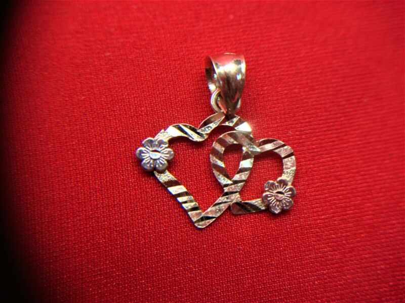 14K yellow gold tri-color intertwined hearts pendant with rose and white gold accents