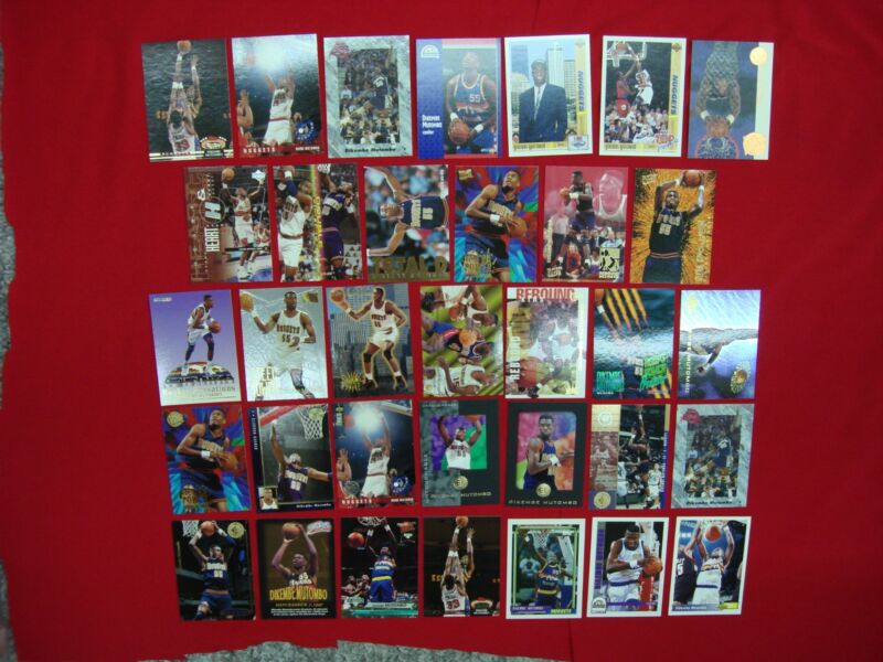 Dikembe Mutombo basketball card lot of 34 cards