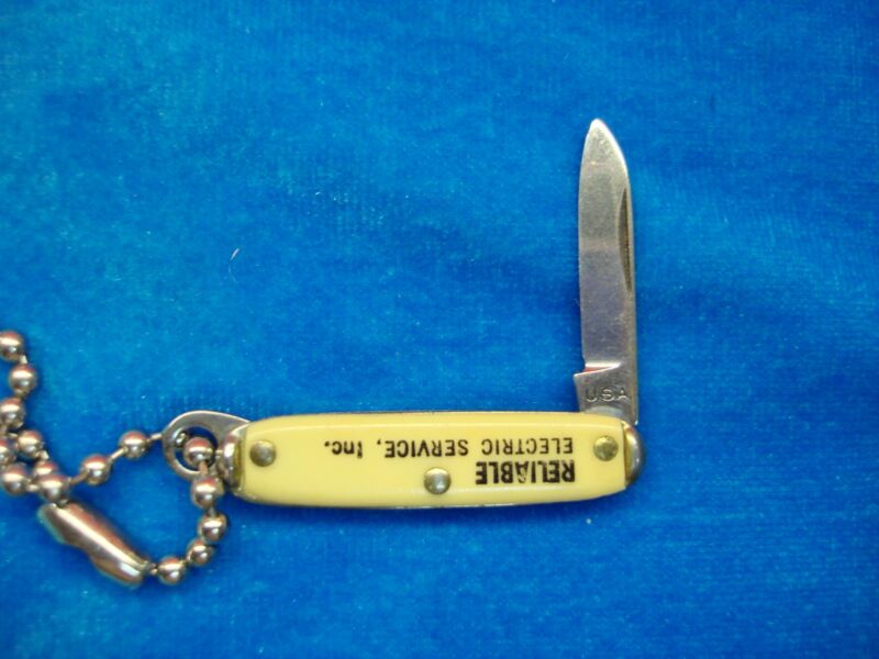 Vintage Reliable Electric Service keychain knife with unused carbon steel blade