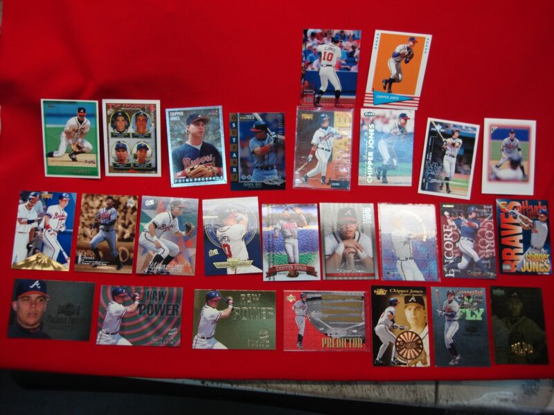 26 Chipper Jones baseball cards in a diverse collection, various grades