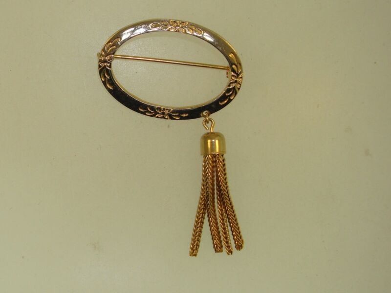 Vintage 1950s-60s gold tone floral circle pin with fringe