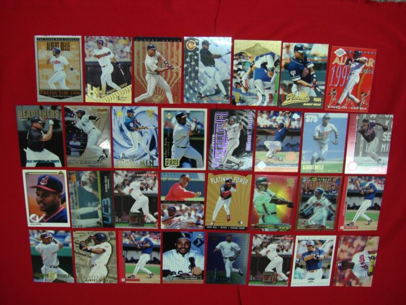 Collection of 29 Albert Belle baseball cards, including premiums, inserts, a die-cut card, and a parallel card.
