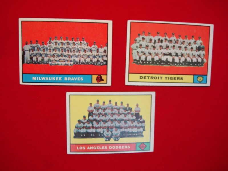 Vintage 1961 Topps Baseball Team Cards featuring the Detroit Tigers, Los Angeles Dodgers, and Atlanta Braves