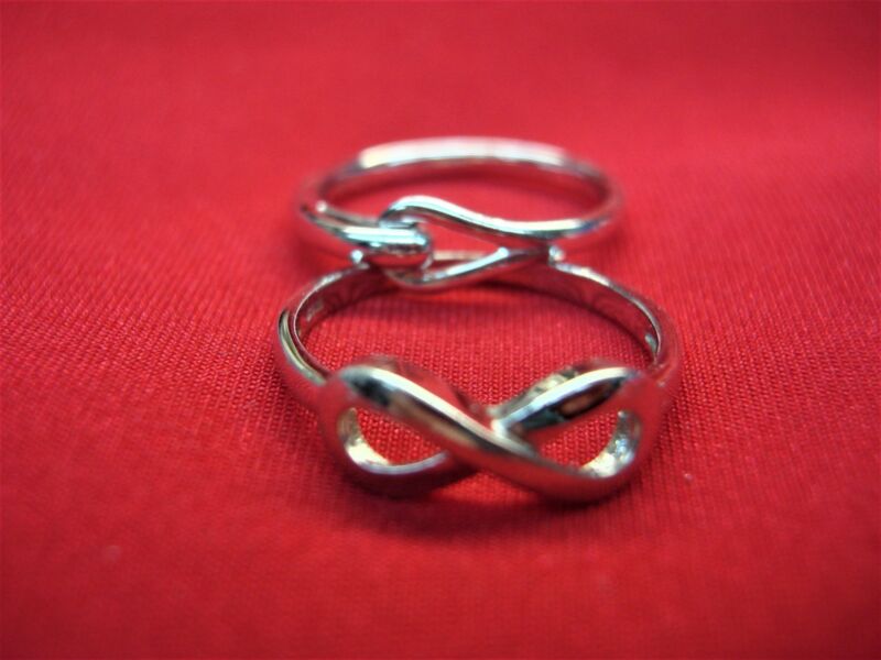 Sterling silver knot ring set, sizes 8 and 7 1/4
