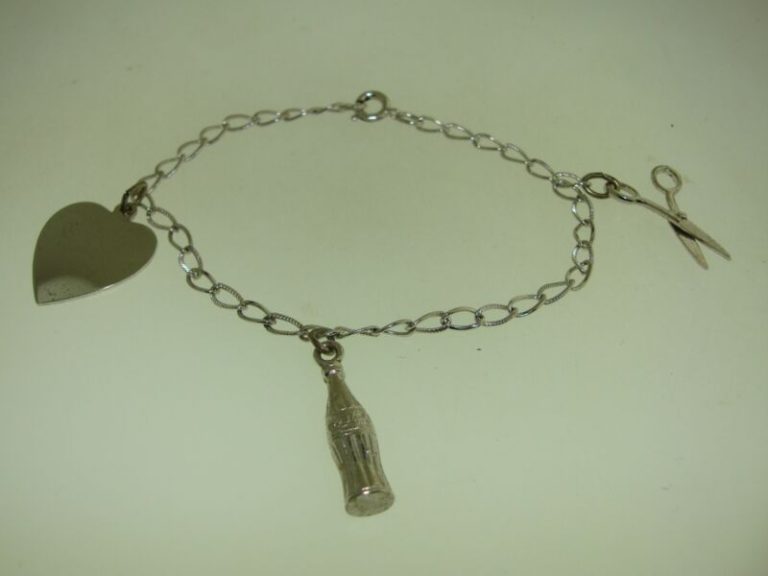 Vintage 1980s sterling silver charm bracelet with Coca-Cola, scissors, and heart charms.