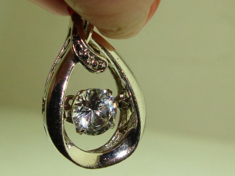 Sterling silver floating sapphire pendant