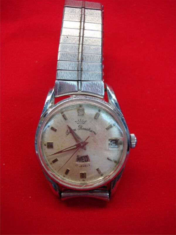 Vintage Andre Bouchard stainless steel wristwatch with day and date function, needs light restoration