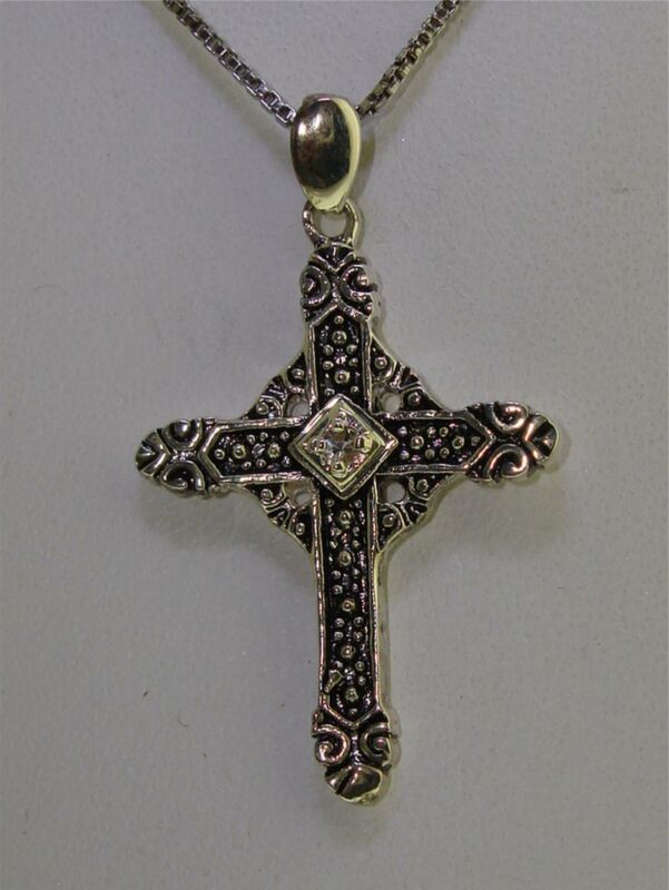 Sterling silver and white topaz cross necklace with ornate design