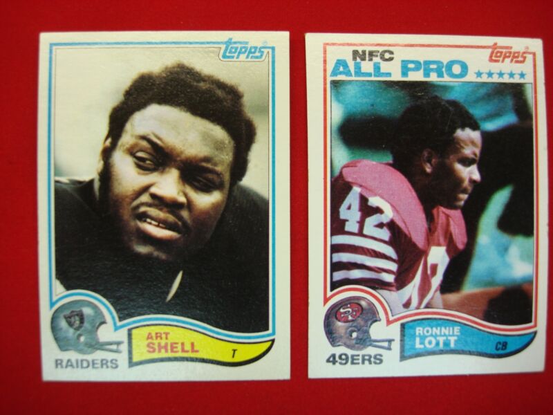 1982 Topps Football Cards of Art Shell (#198) and Ronnie Lott (#486)