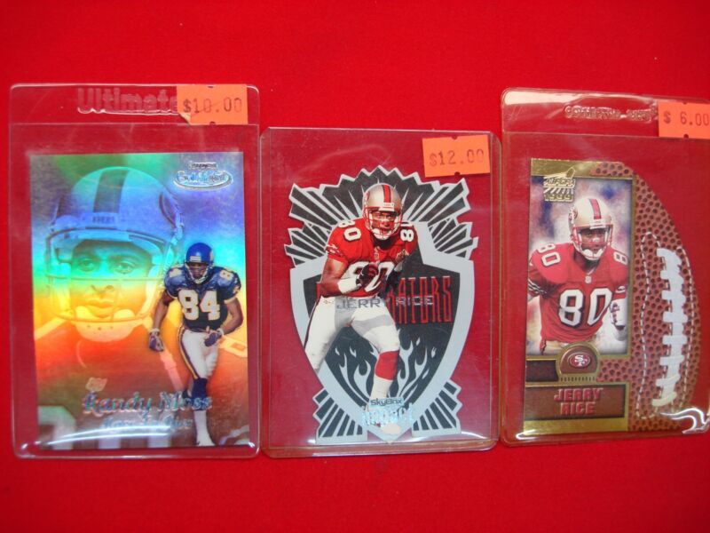 Lot of three (3) NFL star insert cards featuring Randy Moss and Jerry Rice from 1999 Topps, Skybox, and Pacific.