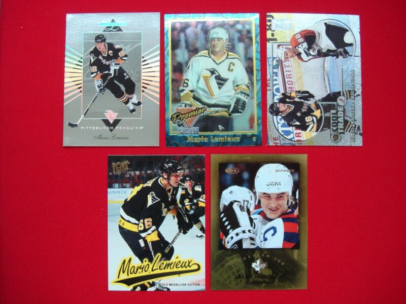 Mario Lemieux hockey card lot featuring serial numbered, insert, foil and Penguins cards