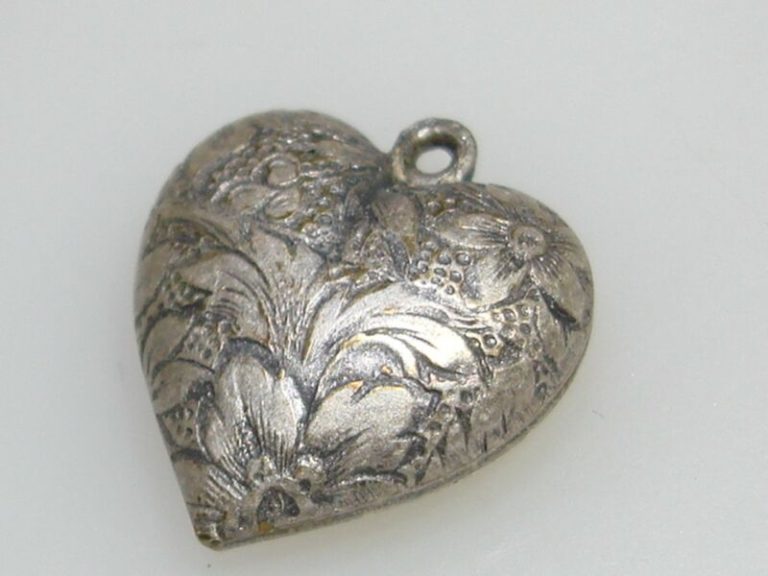 Antique silver heart charm with Art Nouveau floral design